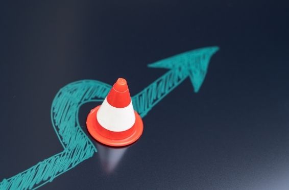 cone with arrow going around it - Misconceptions About Sobriety concept image