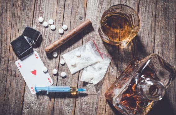 multiple drugs spread out on table - Polysubstance Abuse concept image