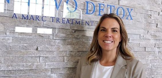 morgan pagels in front of innovo detox sign