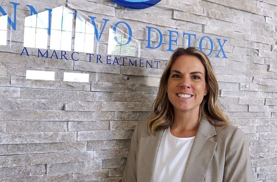 morgan pagels in front of innovo detox sign