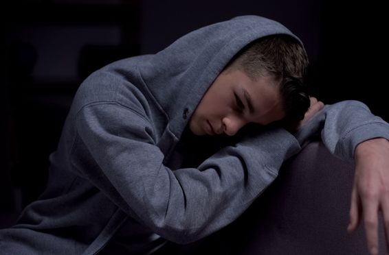 young man going through addiction withdrawal
