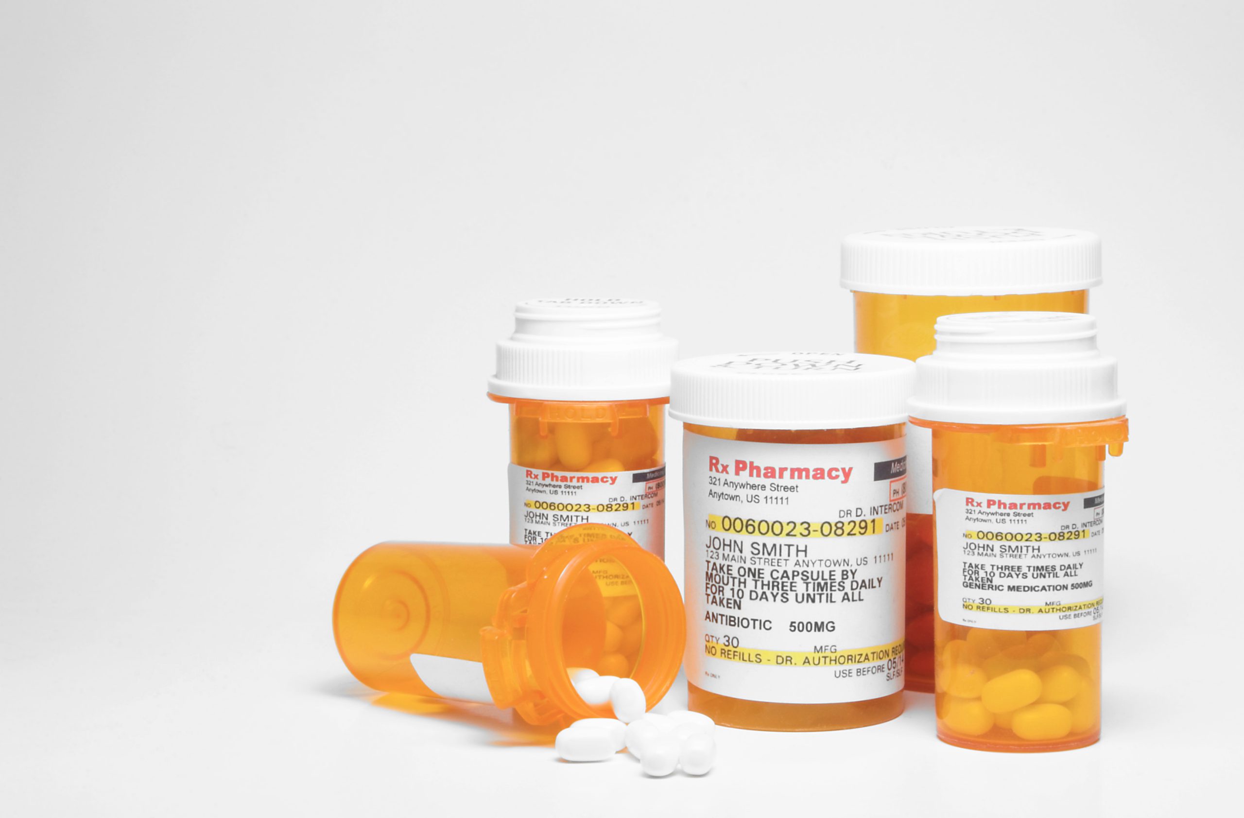 Various medications in orange pill bottles - The Importance of Taking Medication as Prescribed concept image