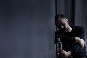 man in the throws of Alcohol Detoxing