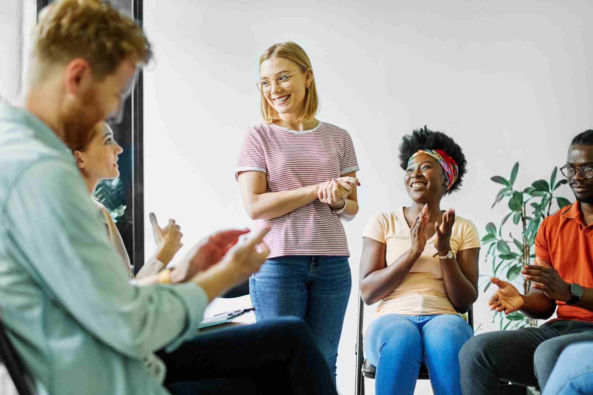 anxiety-disorders-treatment-pennsylvania-recovery-group Group therapy celebrating progress during anxiety disorders treatment in Pennsylvania.