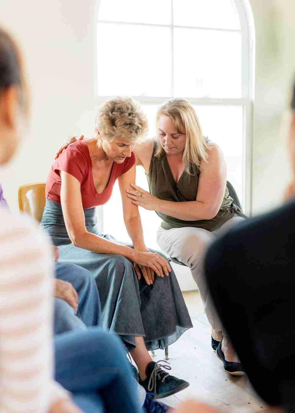 emotional-support-for-families-addiction-recovery Man hugging a loved one while receiving support through Cognitive Behavioral Therapy for addiction recovery.