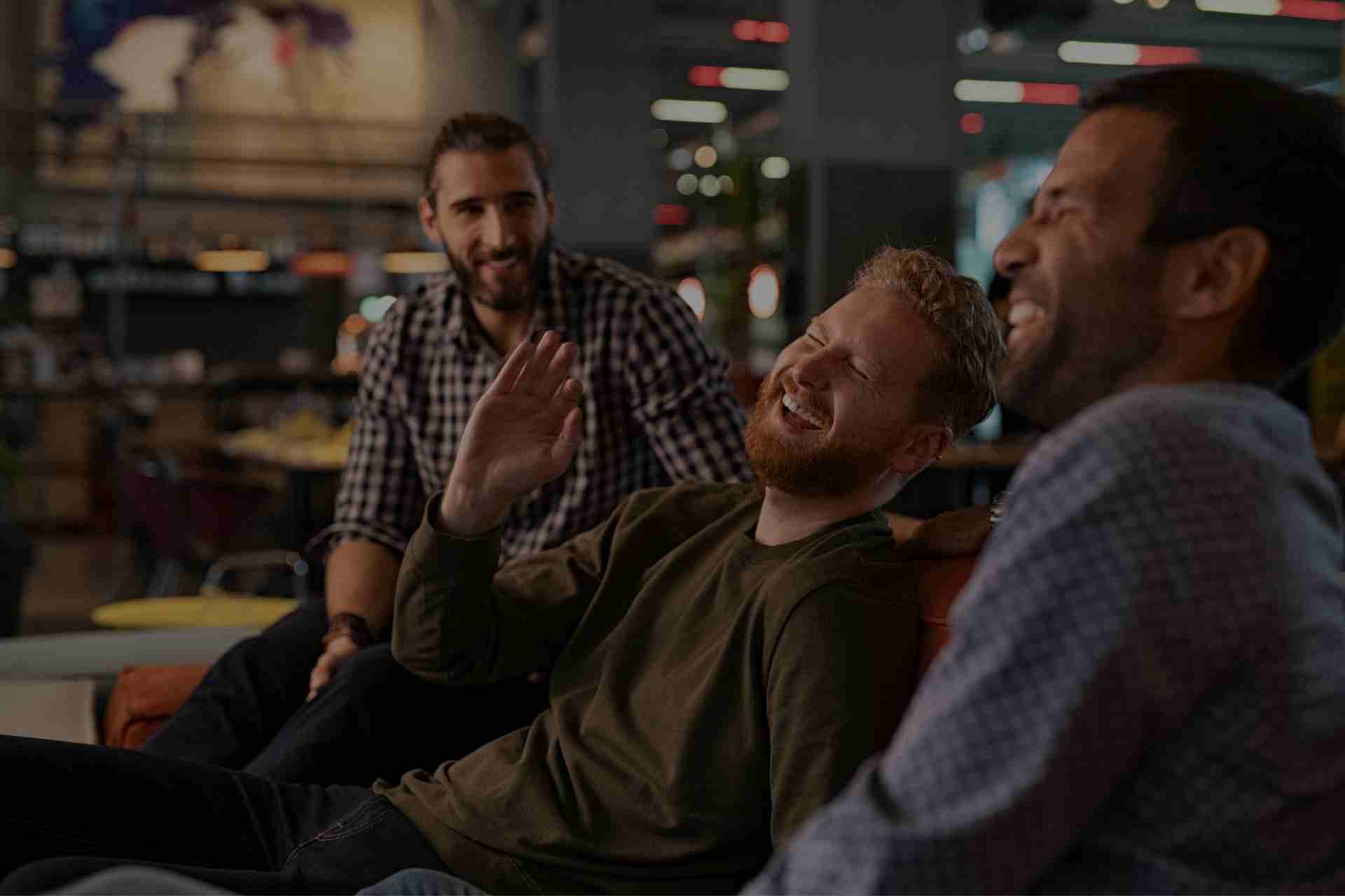 fentanyl-addiction-treatment-pennsylvania-men-peer-support Group therapy session with people sharing support during Cognitive Behavioral Therapy for addiction recovery.